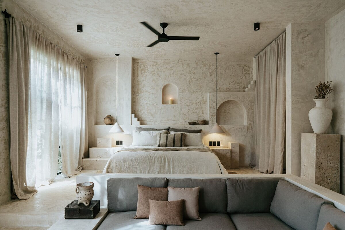 A Serene Design Apartment in Tulum 5 loft-style-living-room-raised-bed-space-l-shaped-sofa-nordroom