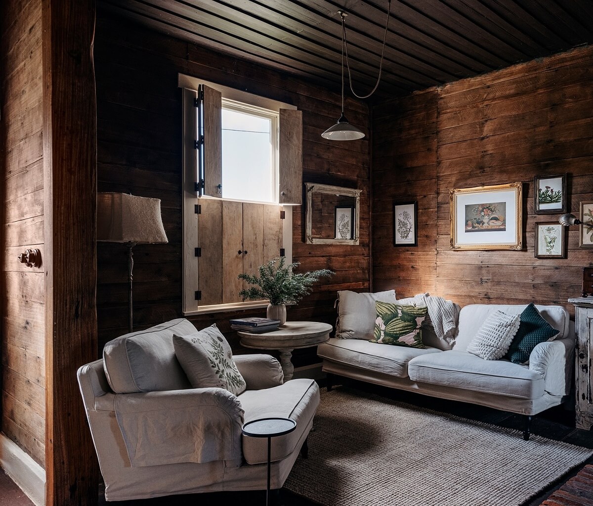 log house living room wooden walls and ceiling