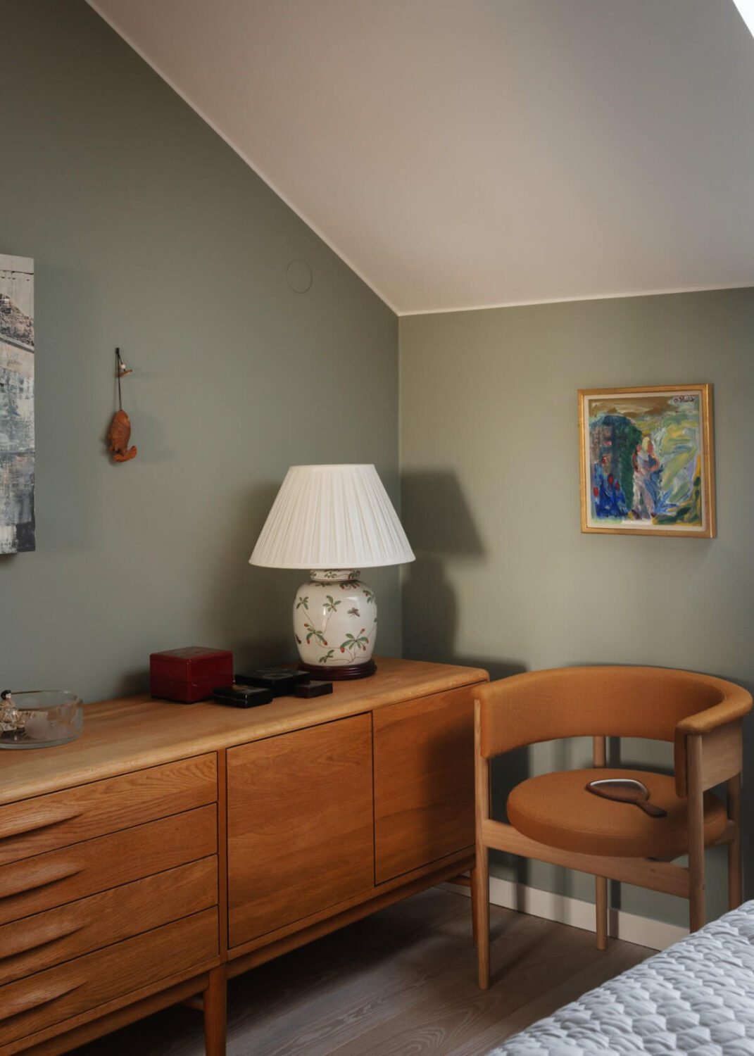 Revisiting a Spectacular Stockholm Penthouse with Exposed Beams 17 midcentury cabinet