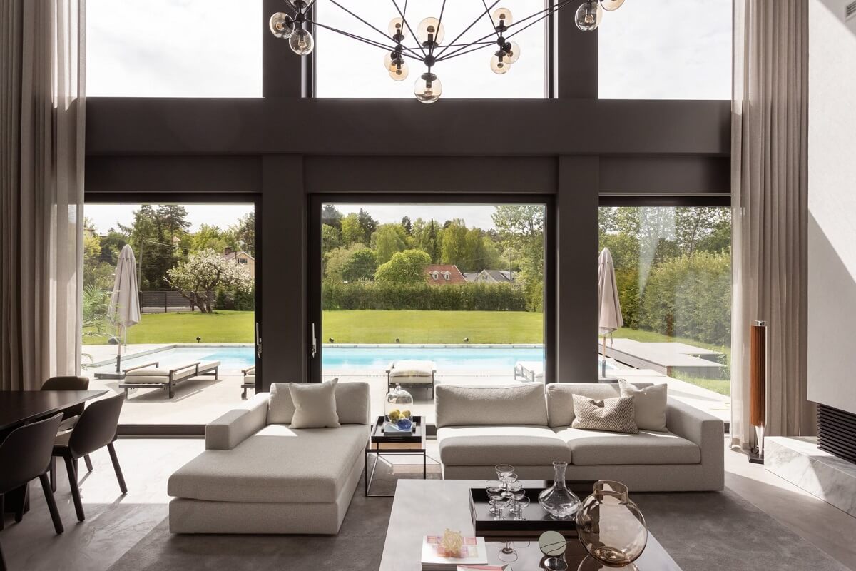 A Luxurious Architect-Designed Villa in Sweden 3 moder living room with huge windows