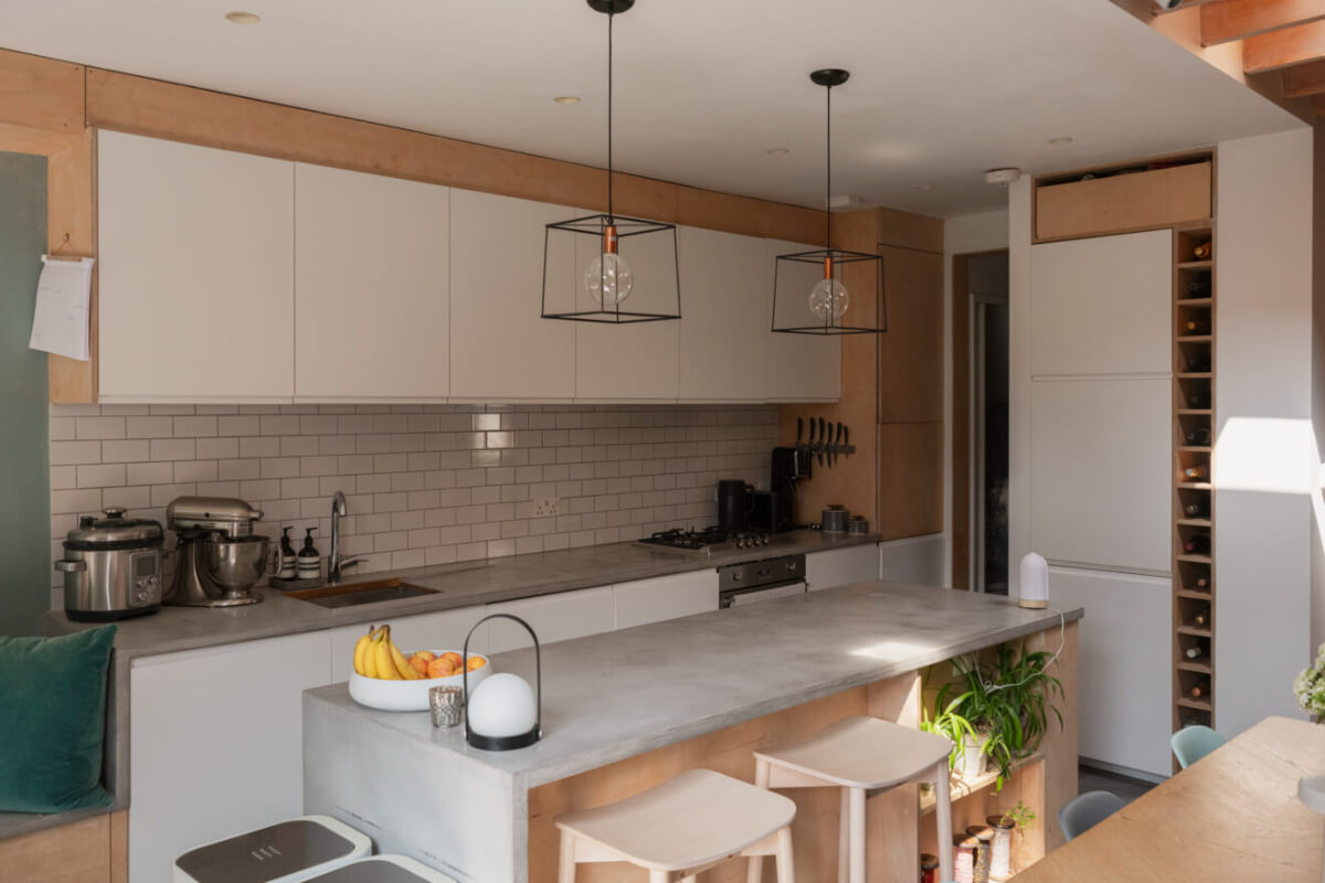 Exposed Brick and Wooden Beams in an Extended London Home 9 modern kitchen white cabinets