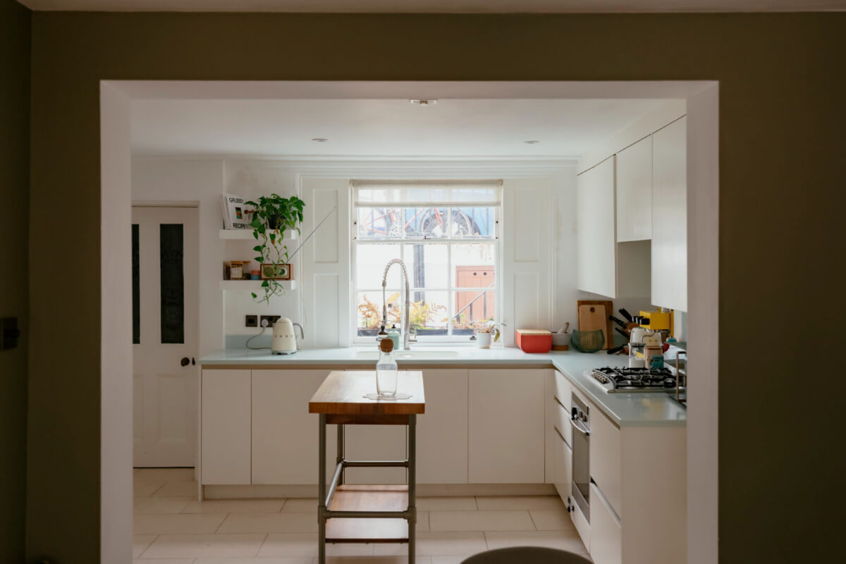 A Renovated Victorian Townhouse with a Small Split-Level Garden 12 modern white kitchen