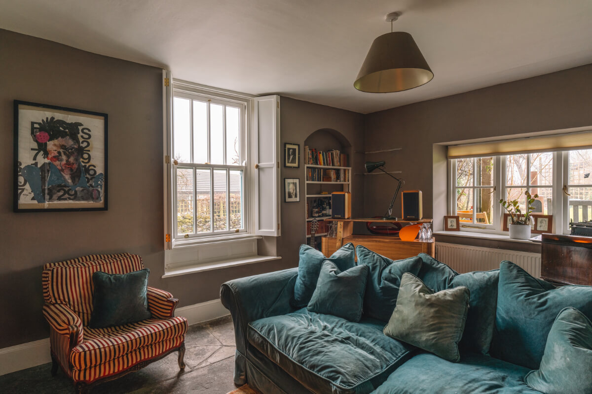 A Colorful 19th-Century Cottage in the Lake District 9 moody living room stone floor
