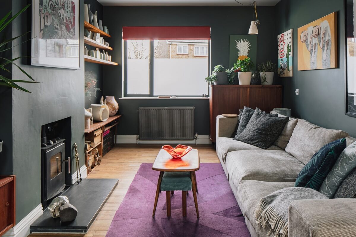 The Color Trends for 2025: Warm, Natural Shades and a Cheerful Accent 49 moody-sitting-room-purple-rug-woodburner-nordroom