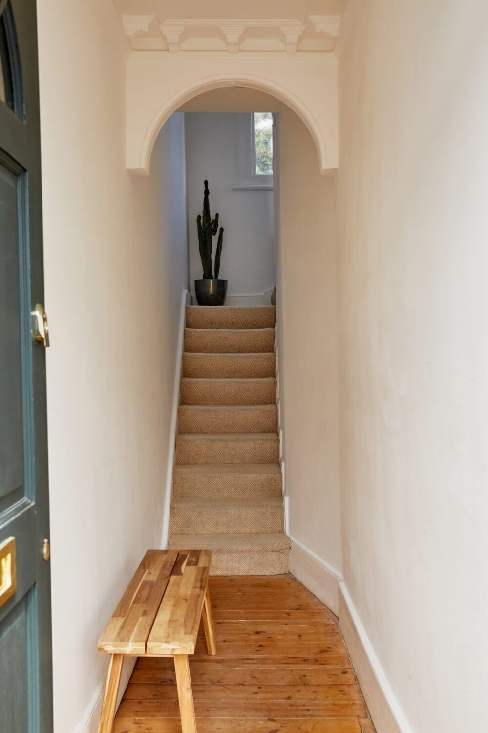 A Light-Filled Maisonette Home in London 15 narrow-hallway-with-bench-staircase-nordroom