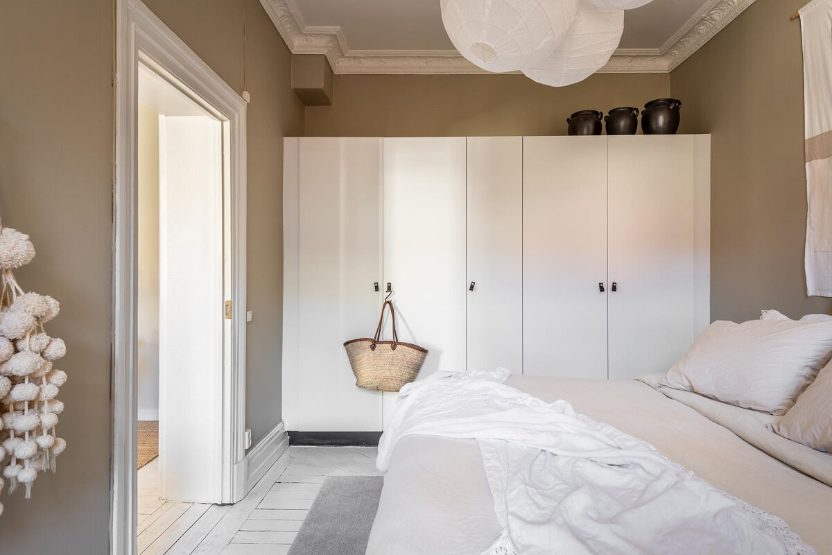 Warm, Neutral Colors in a Lovely Swedish Apartment 15 neutral colored bedroom with wardrobes