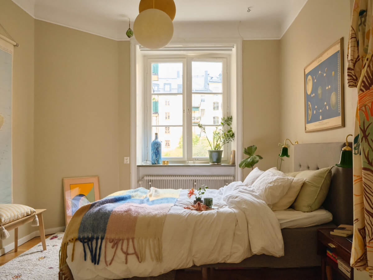 A Beautiful Color Palette and Historic Elements in a Stockholm Apartment 20 neutral light-colored bedroom
