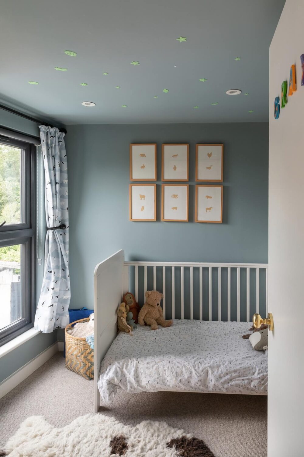 A London Family Home with a Light Modern Extension 21 nursery with light blue walls nordroom