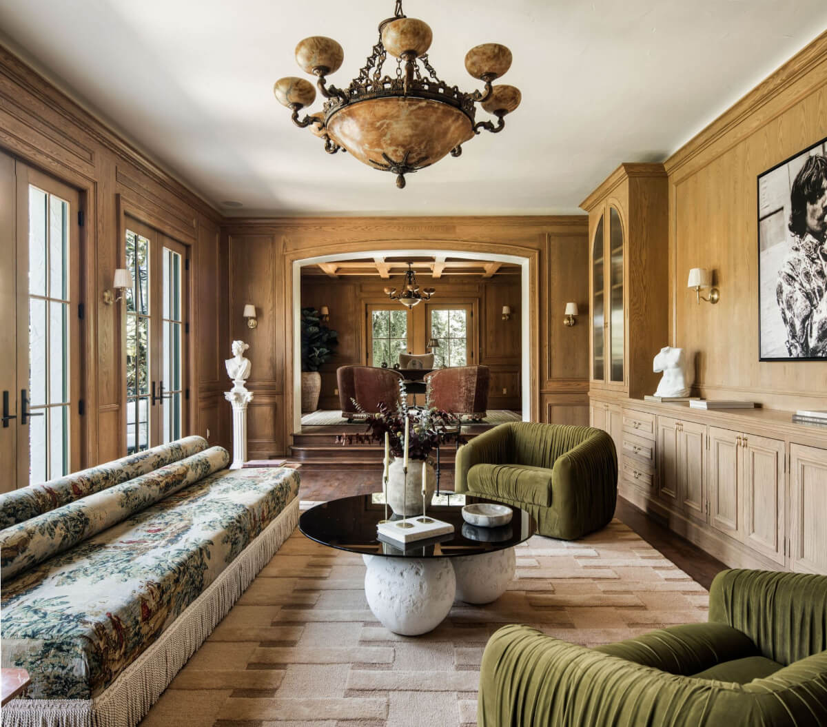 A Reimagined Spanish Colonial Revival Estate in Los Angeles 6 oak-paneled sitting room