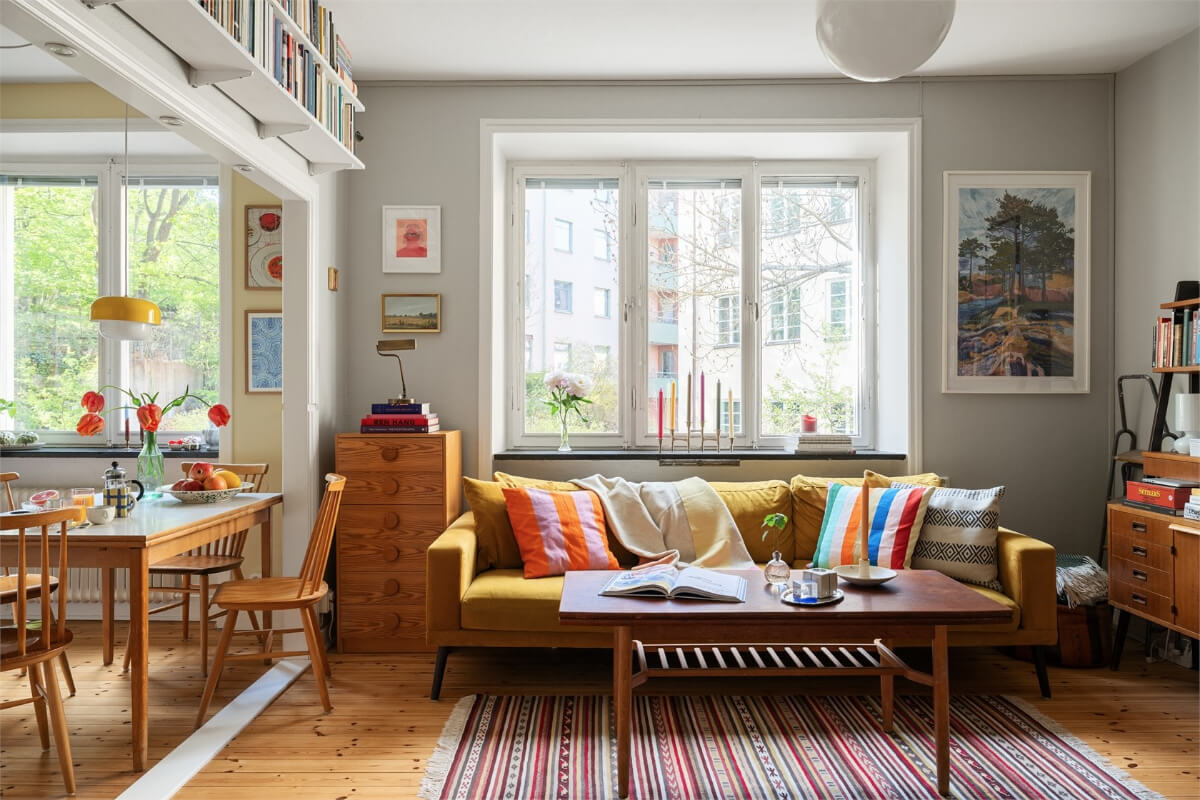 Midcentury Design and Colorful Decor in a Charming Studio Apartment 2 ochre sofa colorful decor charming studio apartment nordroom