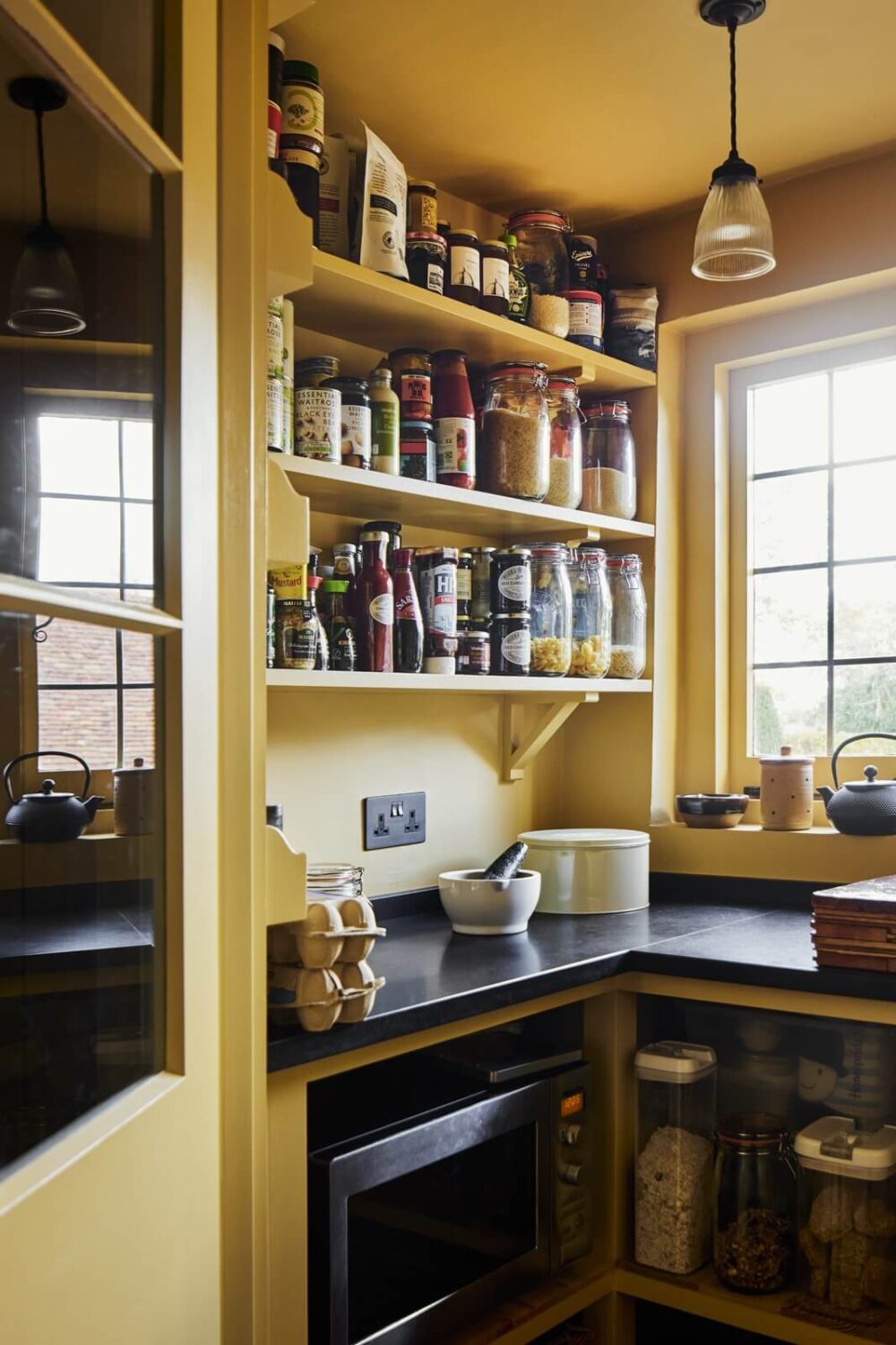 Trend Alert: 36x Color-Drenched Rooms 15 ochre yellow pantry room nordroom