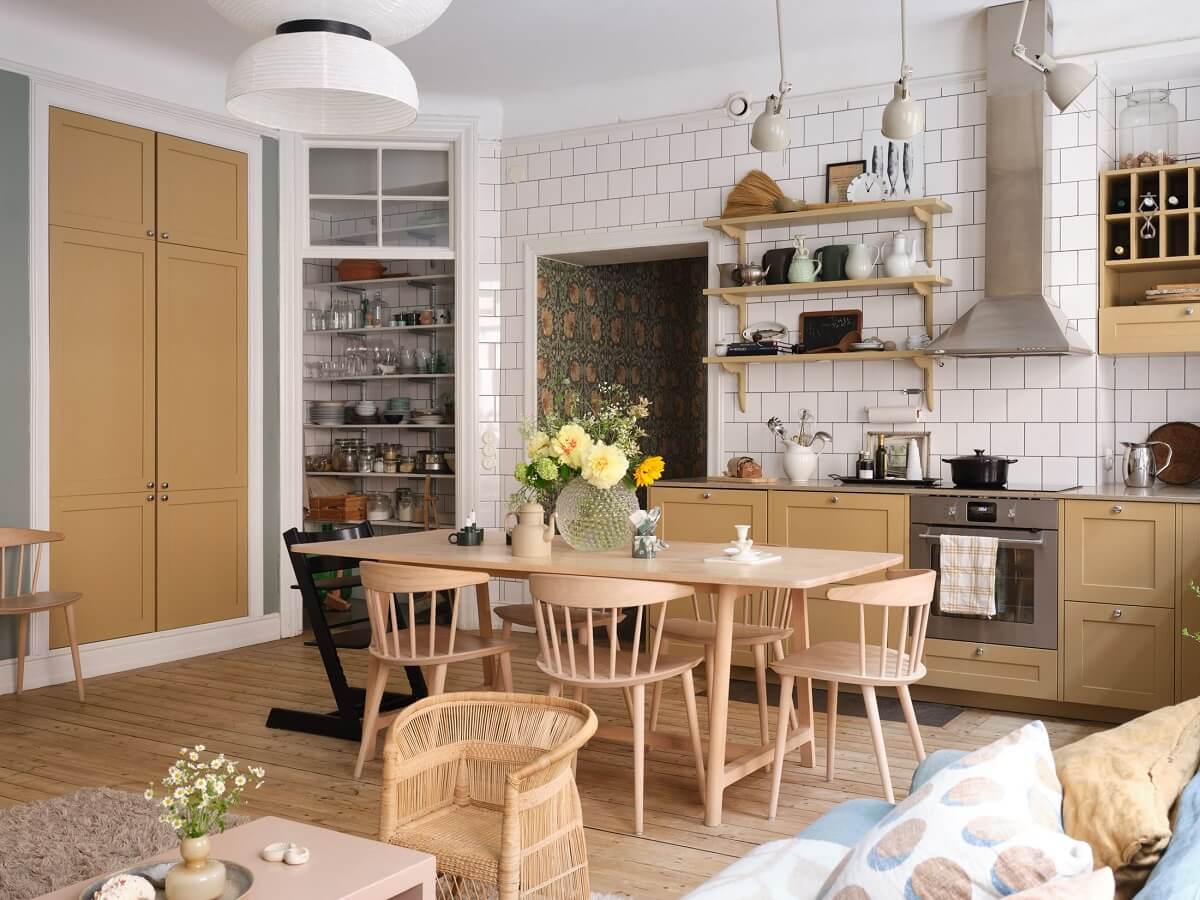 Yellow Kitchen Design Ideas (with Paint Colors) 29 open-plan-kitchen-living-room-ochre-cabinets-wooden-floor-nordroom