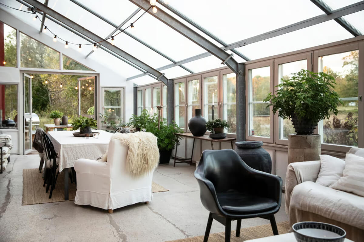 An Open-Plan Gray Home in a Former Textile Factory 20 orangery large table and sofa