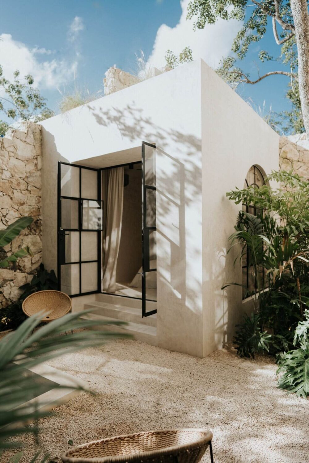 A Serene Design Apartment in Tulum 32 outdoor-space-tulum-airbnb-apartment-steel-framed-doors-nordroom