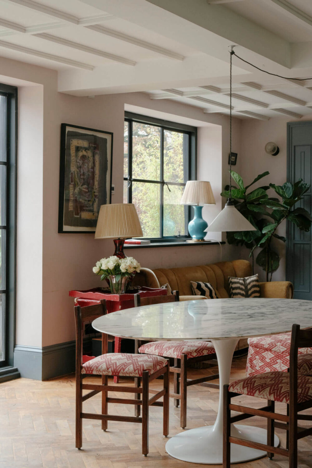 A Barn House with Vintage Decor and Exposed Beams 4 oval dining table
