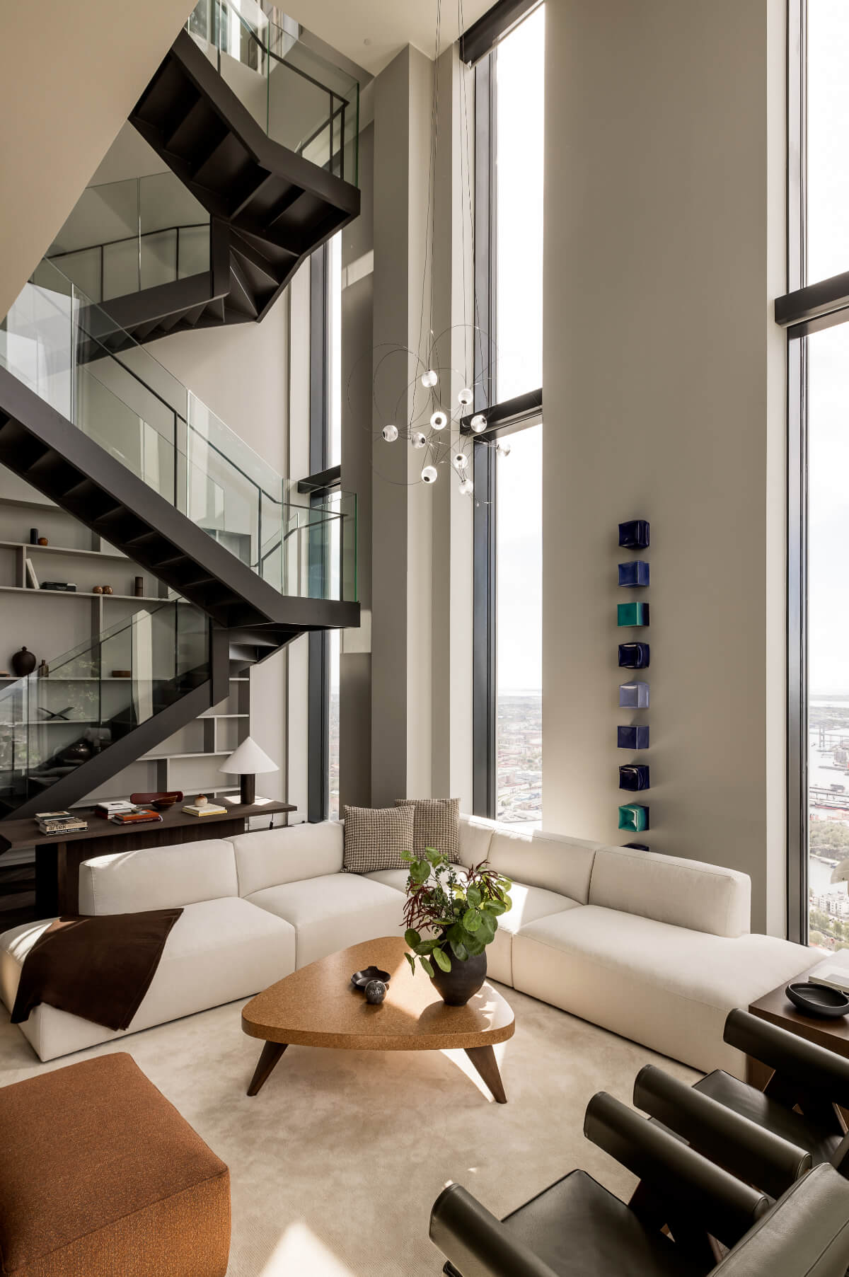 penthouse living room steel staircase