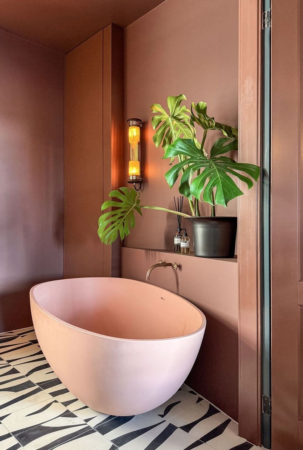 Trend Alert: 36x Color-Drenched Rooms 5 pink bath and graphic floor tiles
