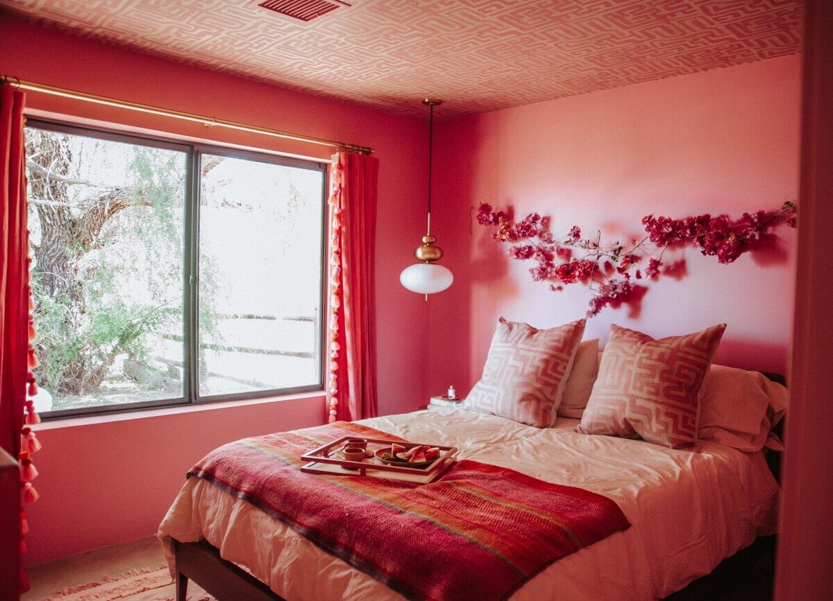 A Colorful Airbnb Home in the Morongo Valley 23 pink-bedroom-wallpaper-on-ceiling-nordroom