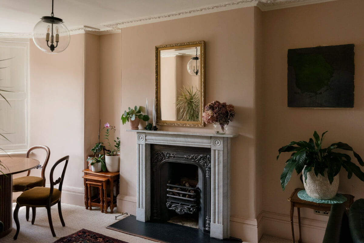 A Classic Georgian House in London with a Lush Garden 2 pink dining room fireplace