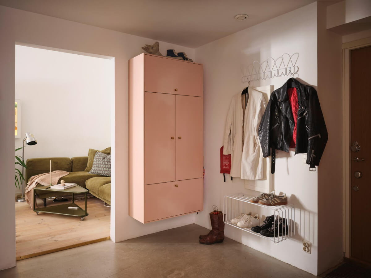 A Bright Family Apartment in a 1950s School Building 27 pink floating storage cabinet A Bright Family Apartment in a 1950s School Building