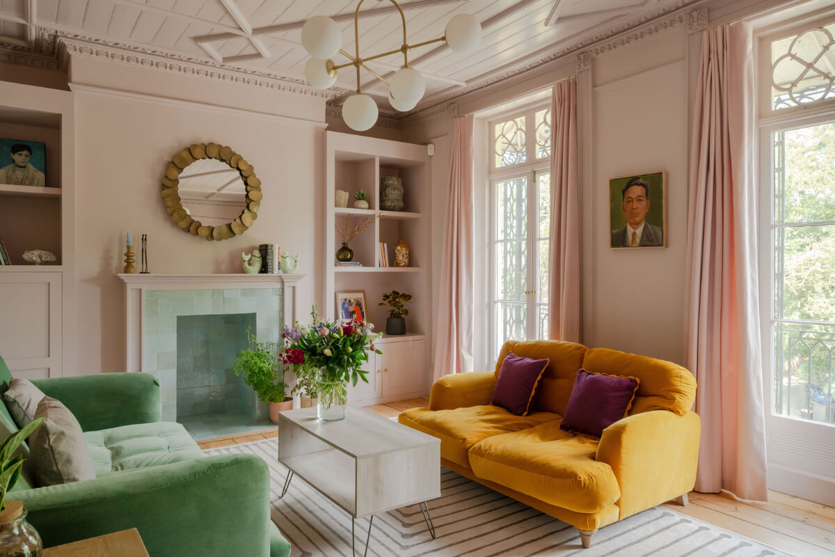 Vibrant Colors in a 19th-Century Regency Townhouse in England 11 pink sitting room with light green tiled fireplace