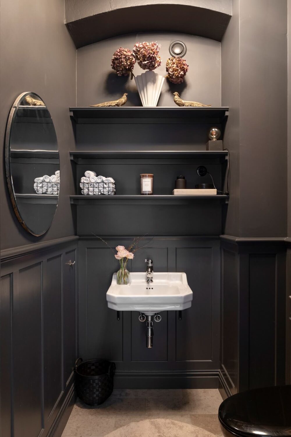 Moody, not Gloomy! Beautiful Dark Small Bathrooms 25 powder room with dark gray walls and shelves above the sink nordroom