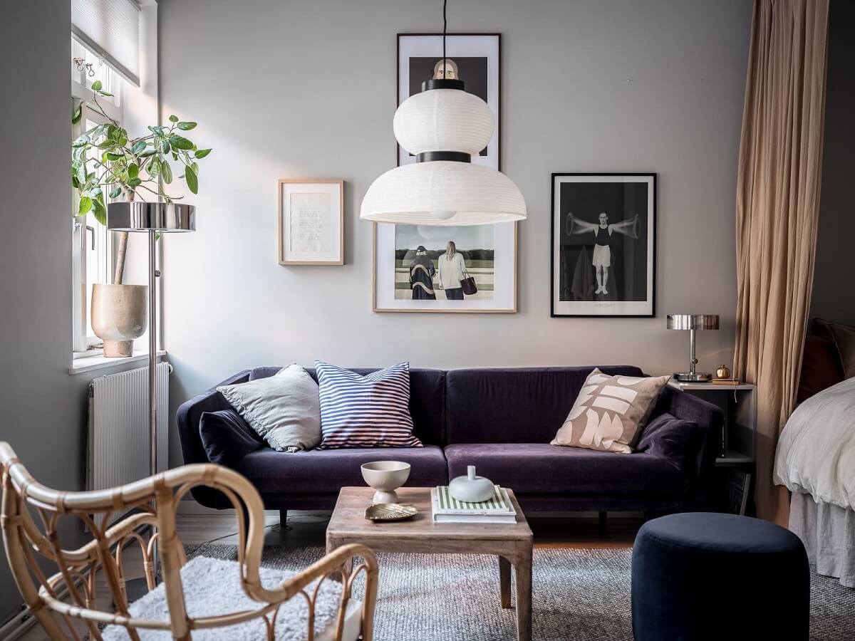 A Cozy Monochrome Gray Studio Apartment 2 purple velvet sofa scandinavian studio apartment nordroom