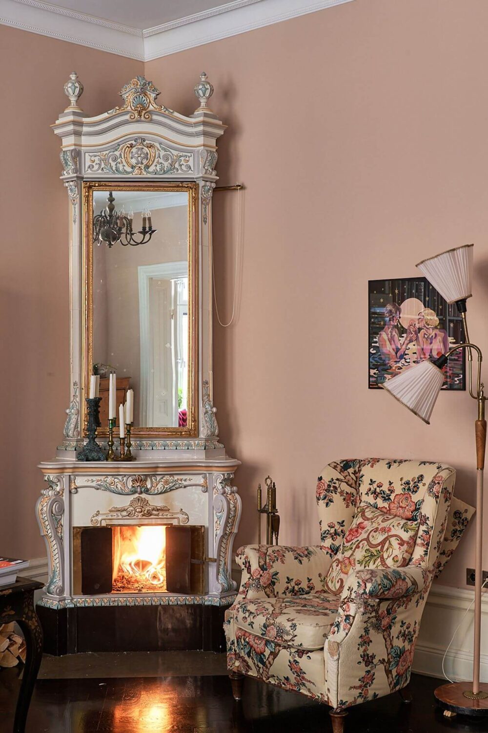 romantic-living-room-pink-walls-fireplace-floral-armchair-nordroom