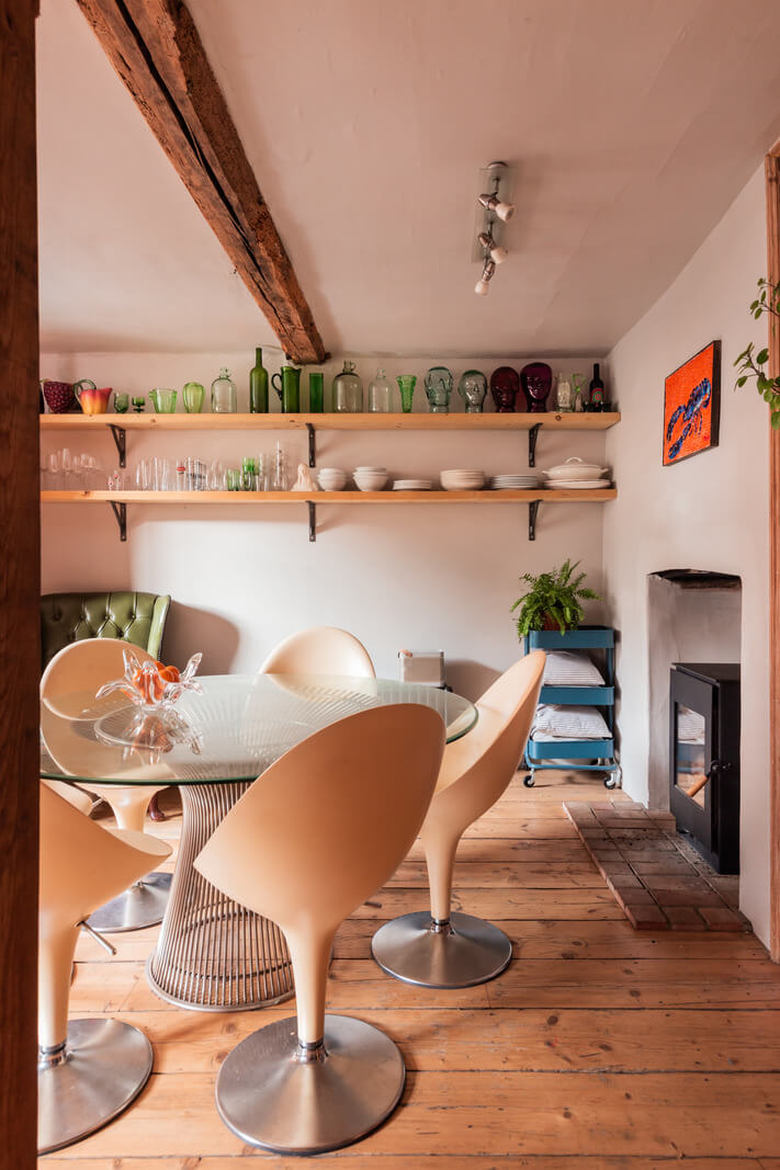 Rustic Wooden Elements in a Historic English House 4 round dinng table shelves wooden floor exposed beam nordroom