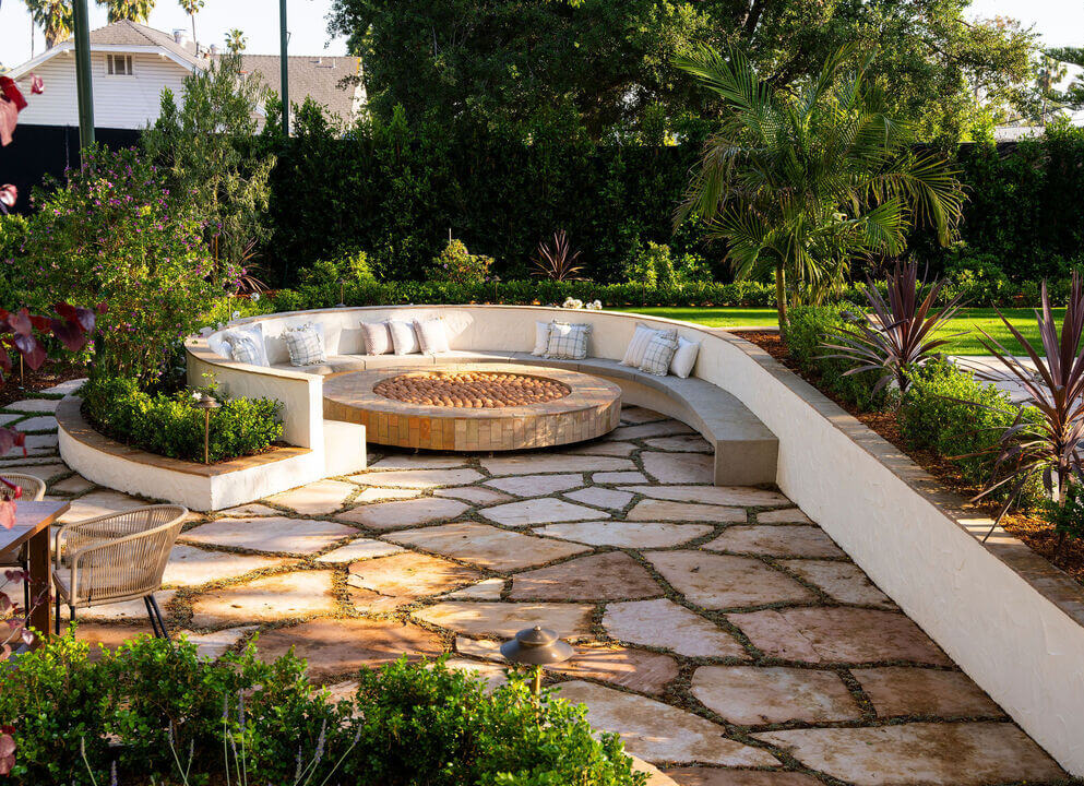 A Reimagined Spanish Colonial Revival Estate in Los Angeles 22 rounded built-in seating garden