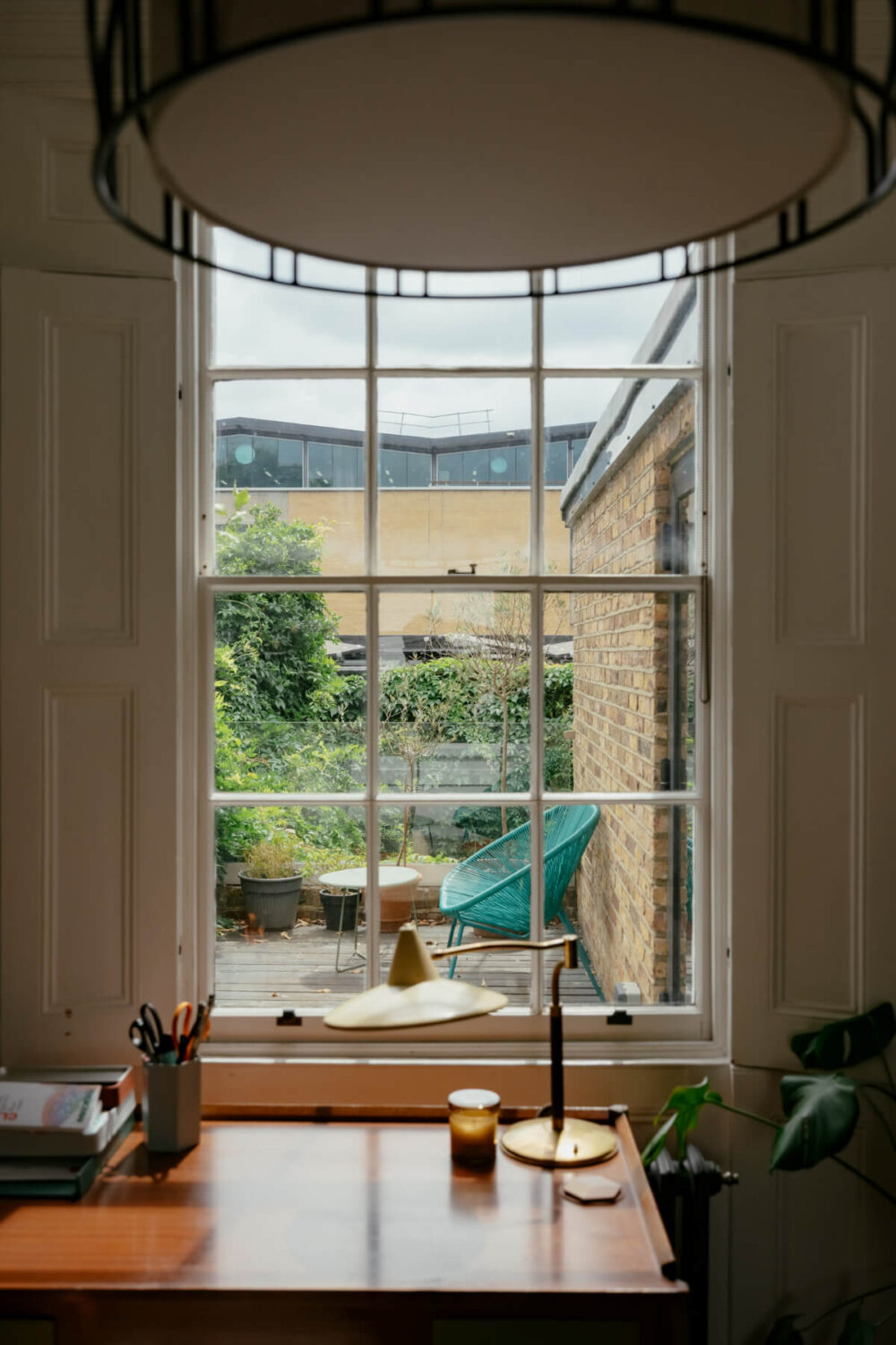 A Renovated Victorian Townhouse with a Small Split-Level Garden 5 sash window garden view