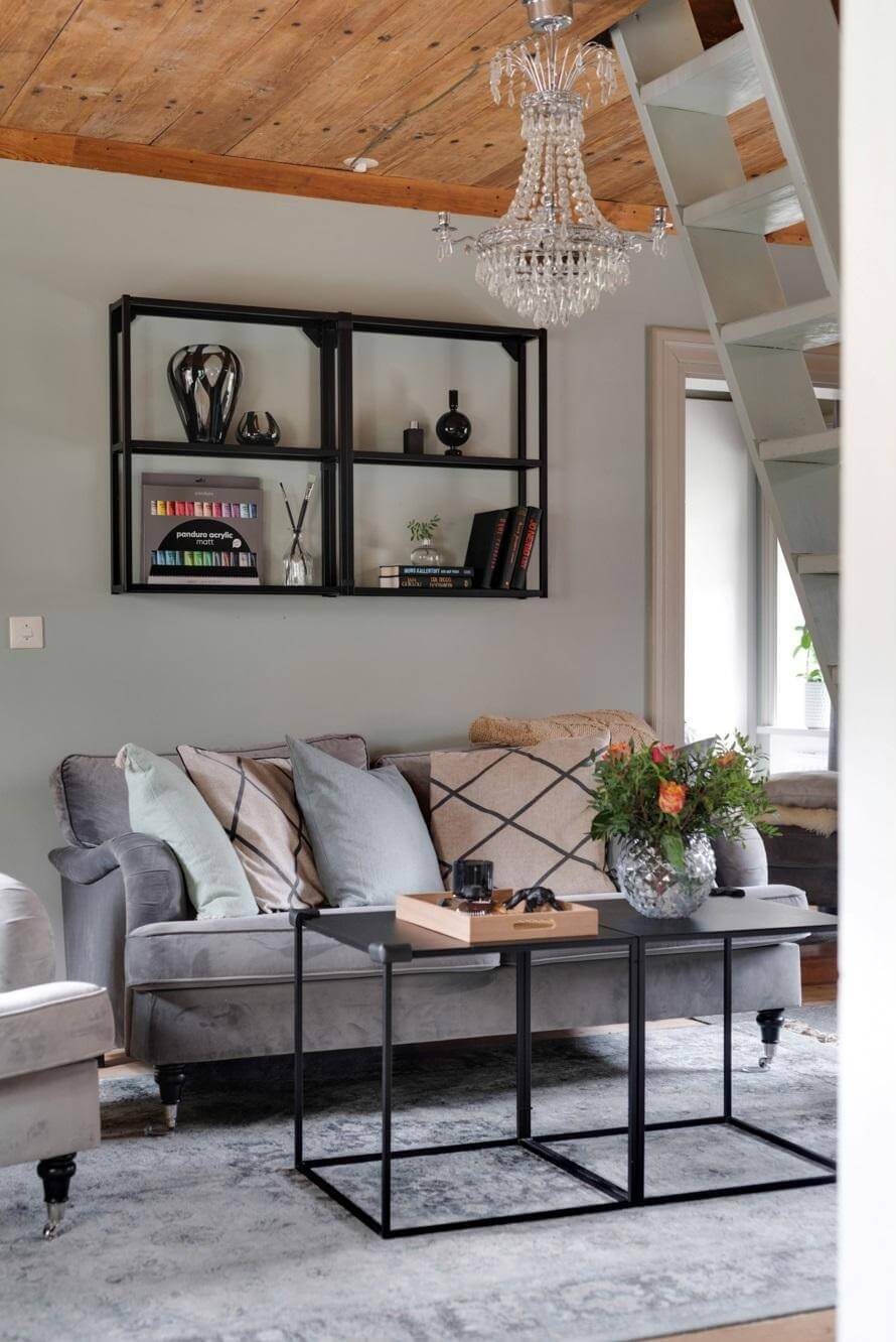 scandi livng room gray sofa wooden ceiling