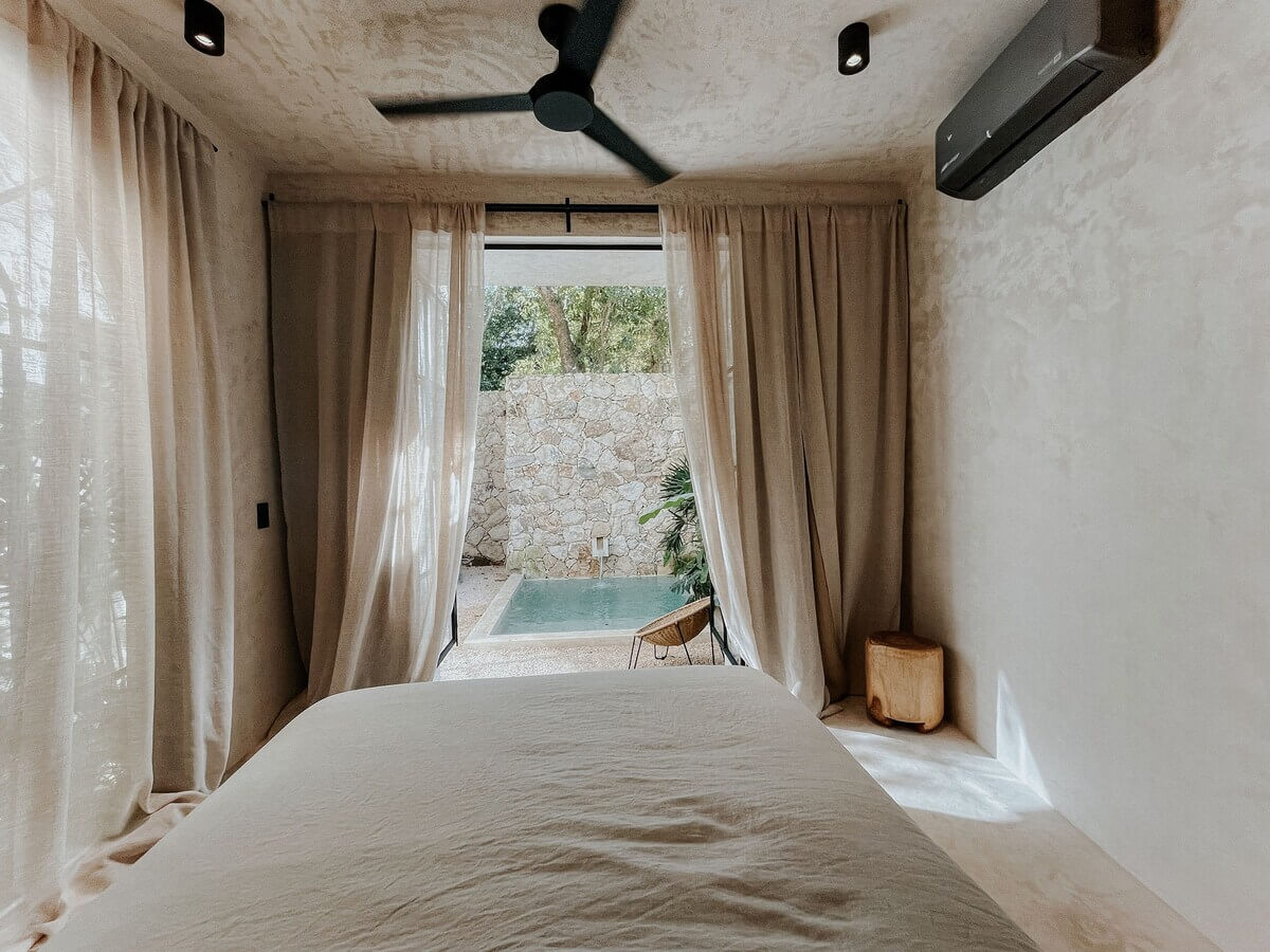 A Serene Design Apartment in Tulum 24 serene-bedroom-view-to-swimming-pool-tulum-airbnb-nordroom