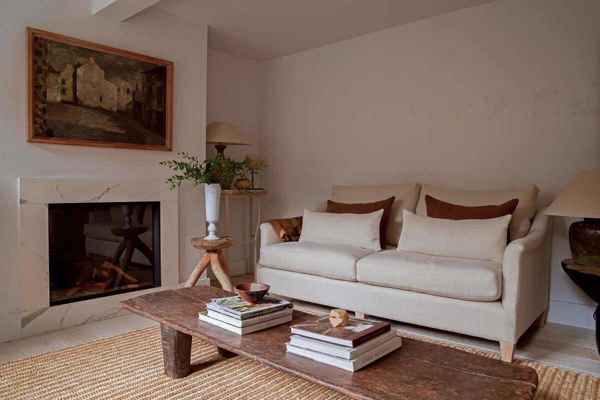 serene living room jute rug fireplace