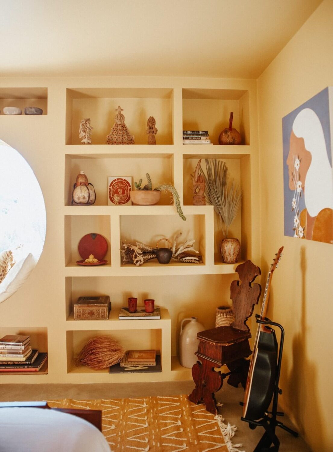 A Colorful Airbnb Home in the Morongo Valley 19 shelves-pale-yellow-bedroom-nordroom