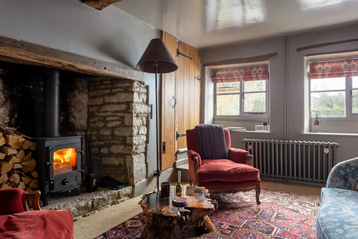A Charming Cotswold Cottage with a deVOL Kitchen 10 sitting room brick firpelace