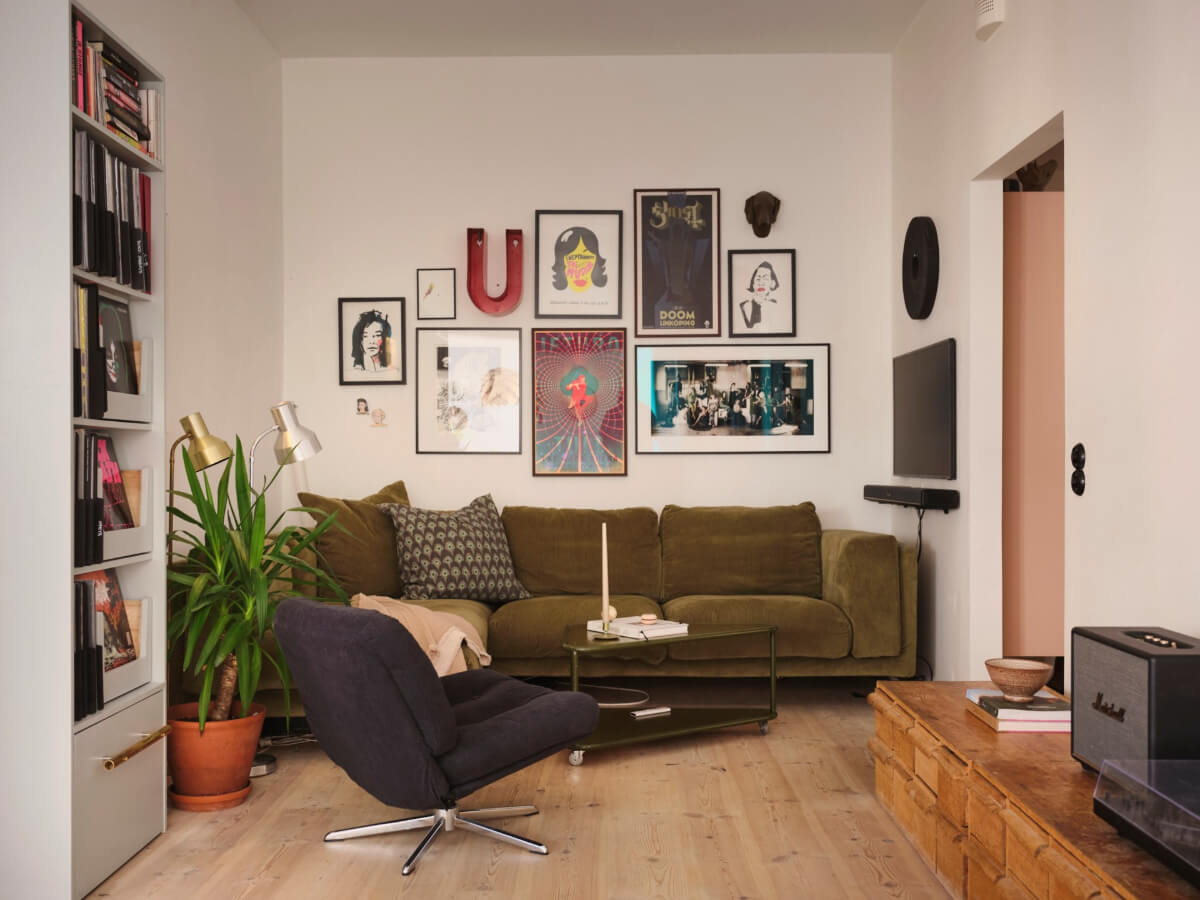 A Bright Family Apartment in a 1950s School Building 2 sitting room green sofa