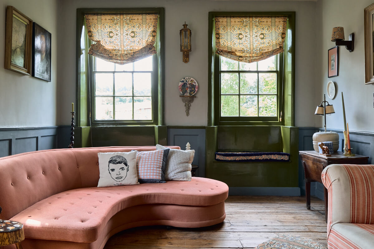 A Colorful Design-Led Georgian House in the Heart of Henley-on-Thames 21 sitting room green window frames with window seats