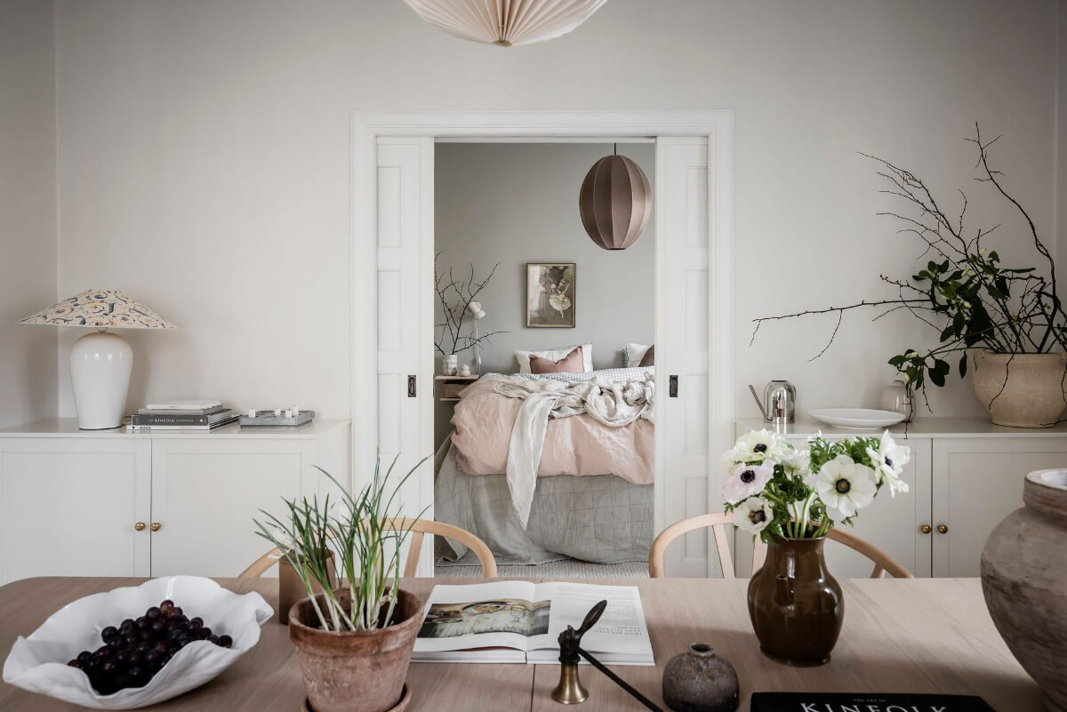 A Light Corner Apartment with an Open Flowing Floor Plan 26 sliding doors view into bedroom