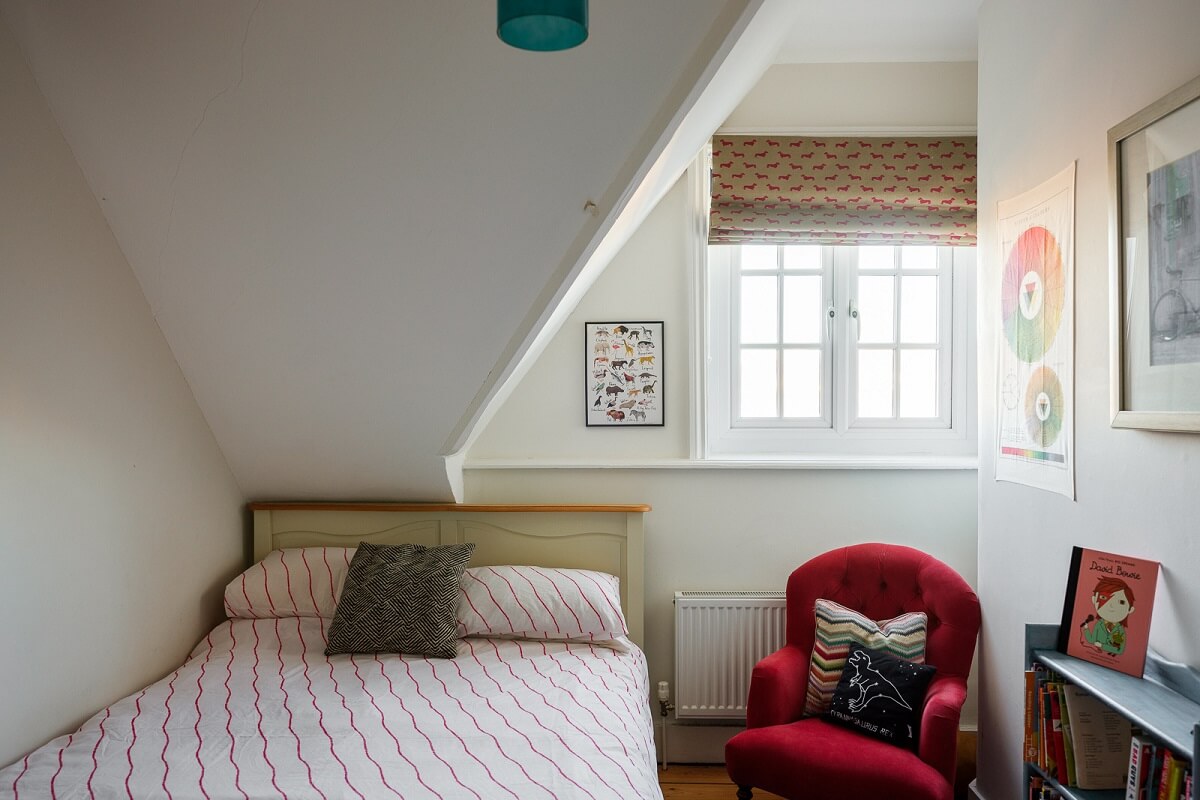small-attic-bedroom-red-chair