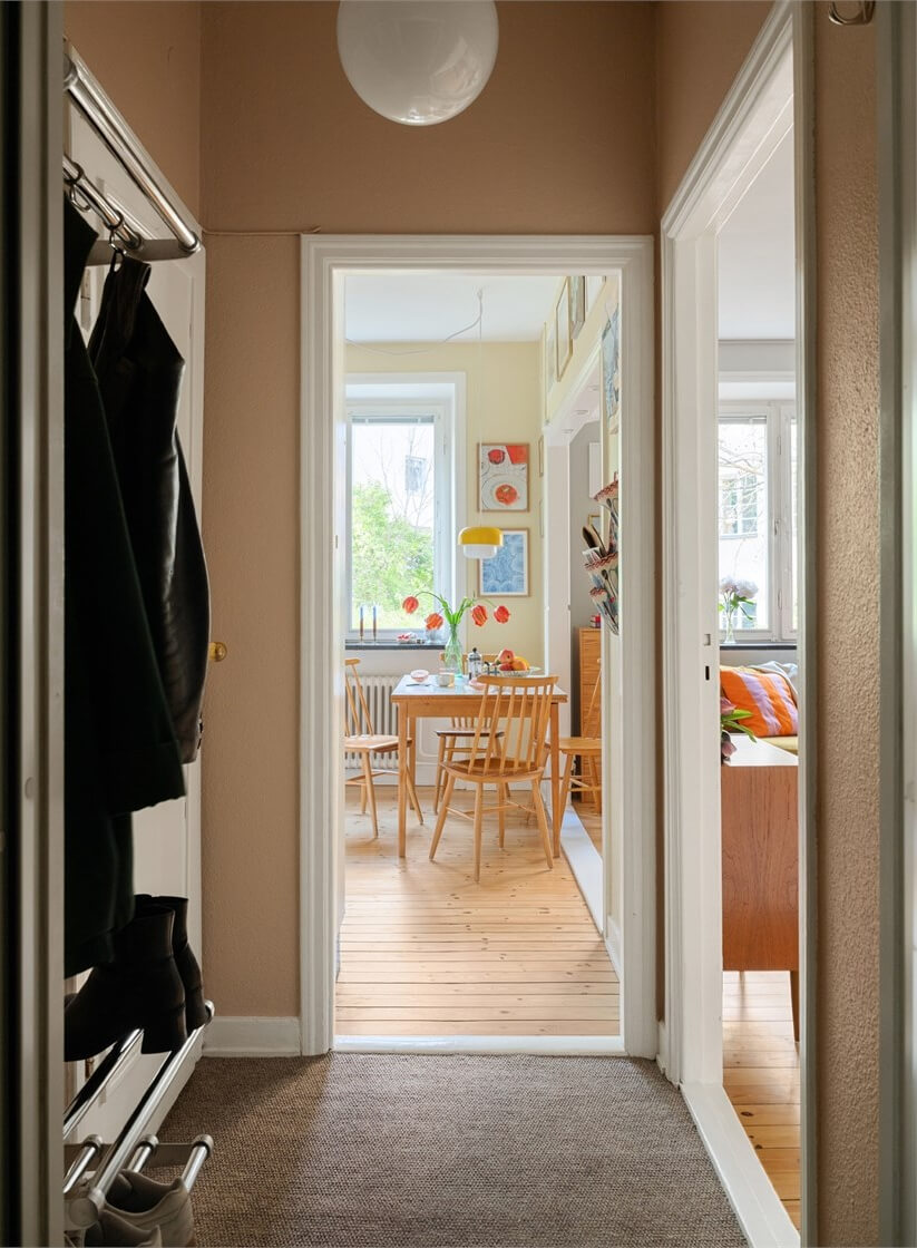 Midcentury Design and Colorful Decor in a Charming Studio Apartment 20 small carpeted hall Midcentury Design and Colorful Decor in a Charming Studio Apartment