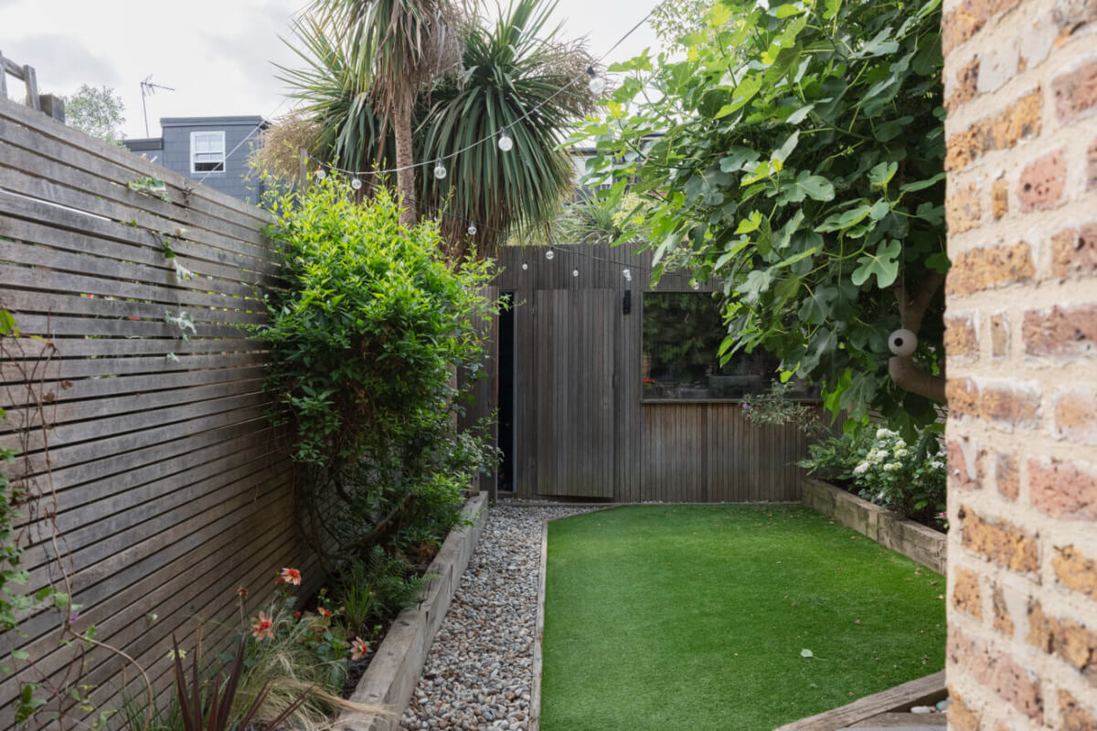 Exposed Brick and Wooden Beams in an Extended London Home 16 small city garden