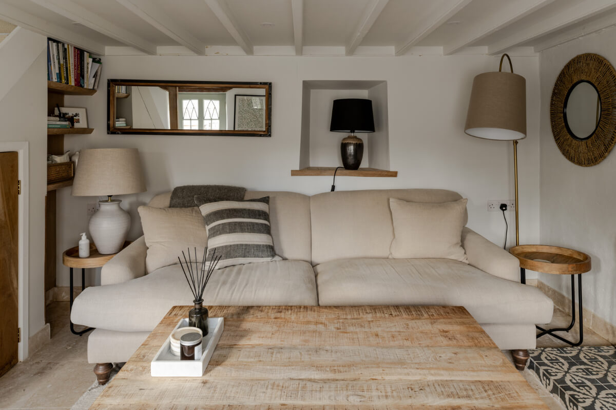 A Charming Stone Cottage with Period Features in Cornwall 2 small cottage living room bookshelves