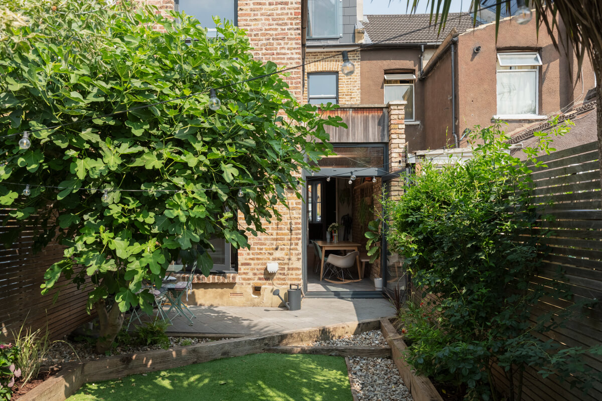 Exposed Brick and Wooden Beams in an Extended London Home 17 small garden city home