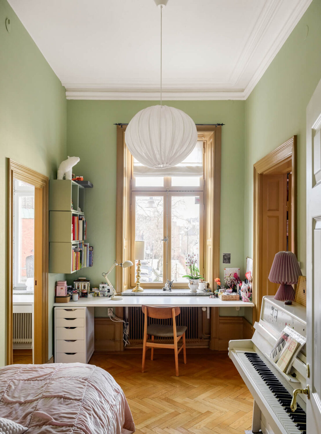 A Pink Living Room in a Light-Filled Stockholm Apartment 11 small green bedroom with desk under window