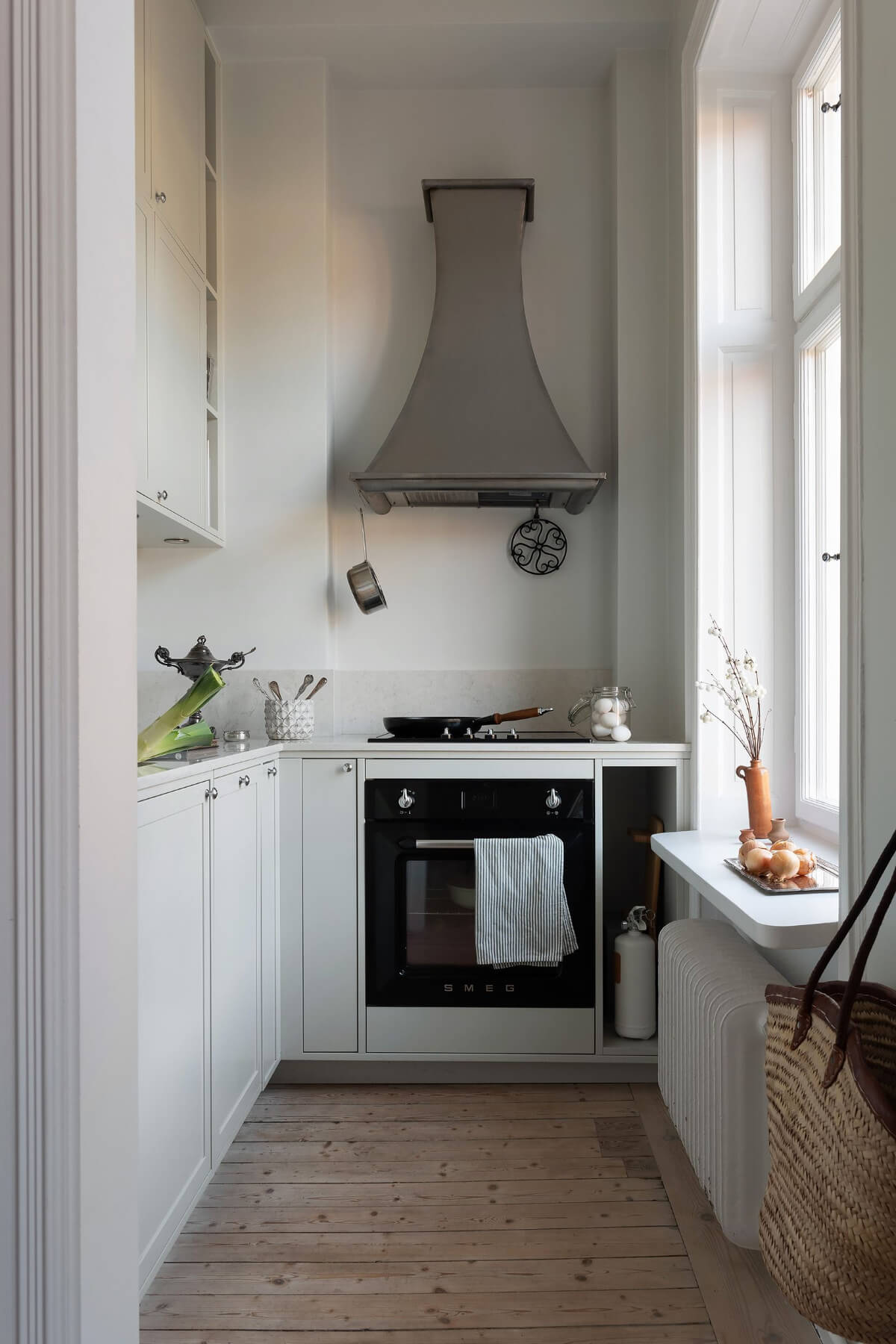 small kitchen double upper cabinets wooden floor