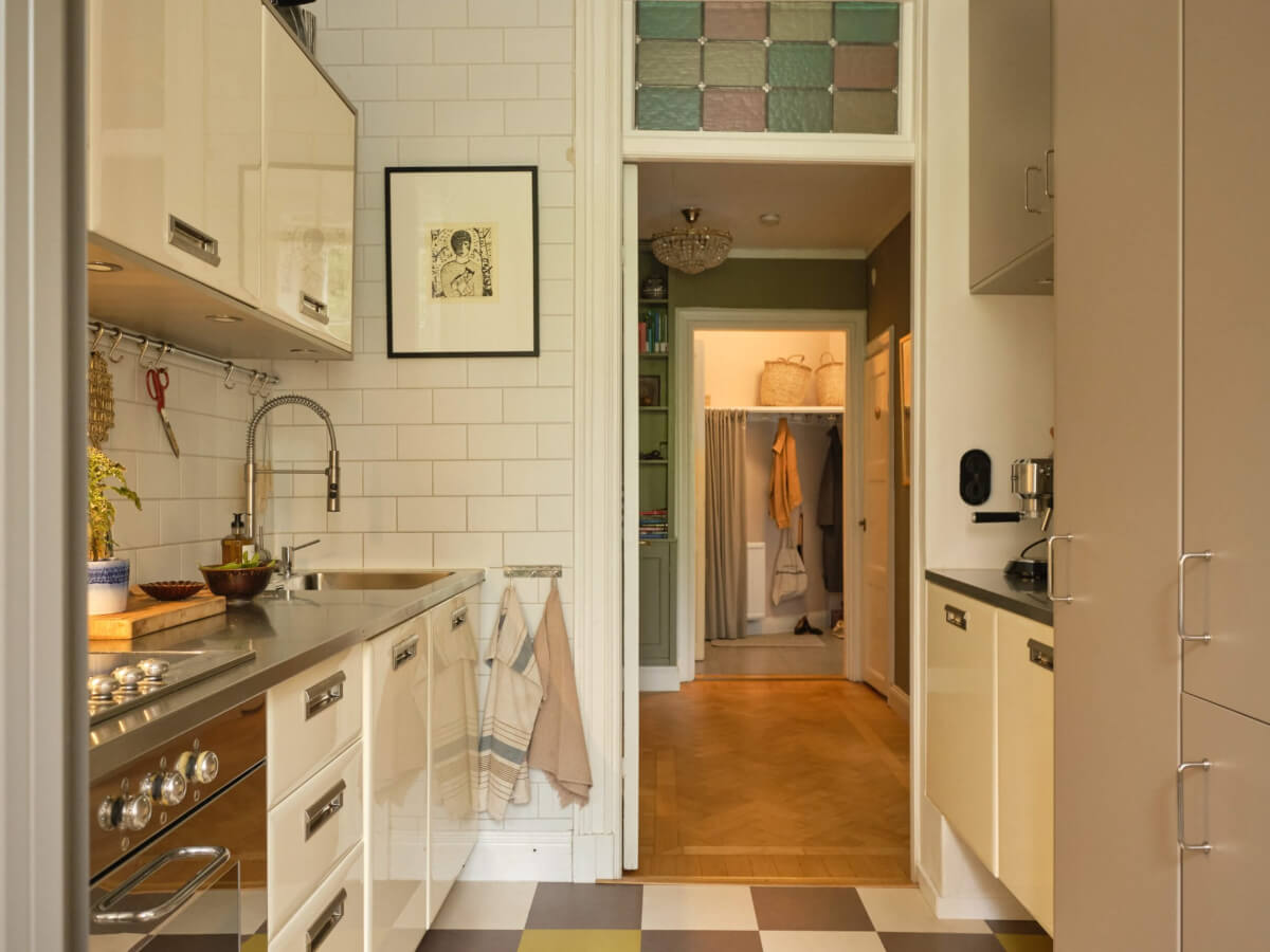 A Beautiful Color Palette and Historic Elements in a Stockholm Apartment 18 small kitchen stained glass window