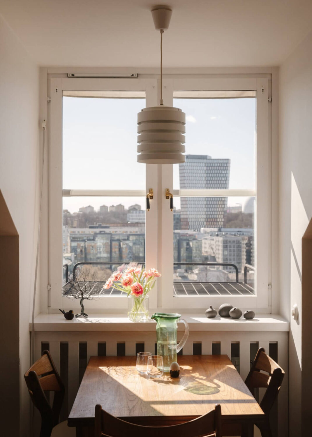 Revisiting a Spectacular Stockholm Penthouse with Exposed Beams 14 small kitchen table