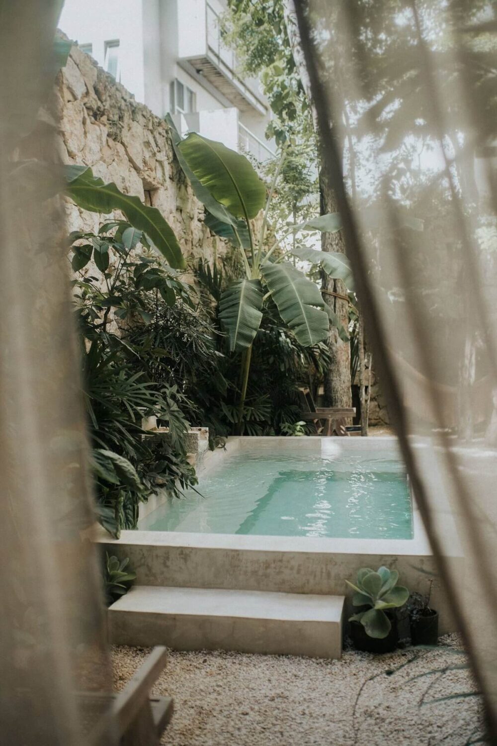 Rustic Wooden Elements in a Stylish Tulum Airbnb 27 small-patio-garden-swimming-pool-airbnb-home-tulum-mexico-nordroom