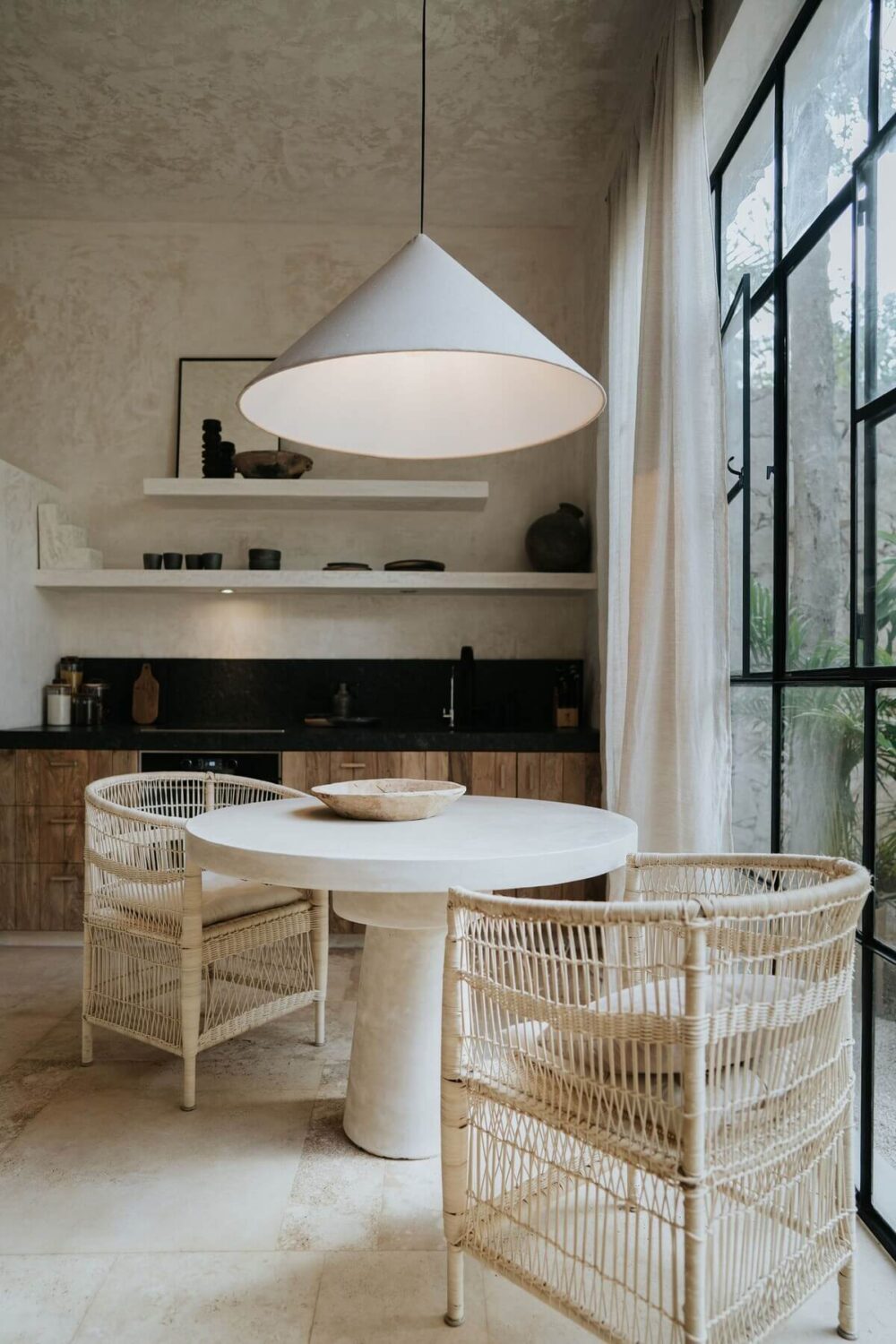 A Serene Design Apartment in Tulum 19 small-round-dining-table-wicker-chairs-airbnb-tulum-mexico-nordroom